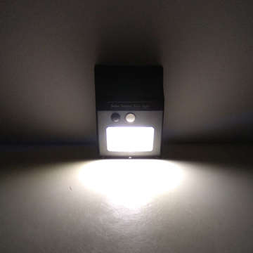 Lampa solarna LED Zewnętrzna z czujnikiem ruchu i zmierzchu 48 LED COB